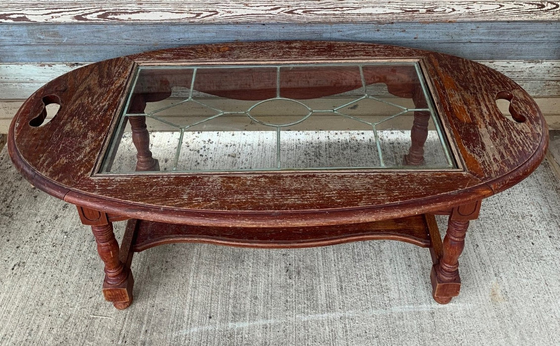 AMERICAN OAK COFFEE TABLE WITH INSET BRASS CAMBED WINDOW