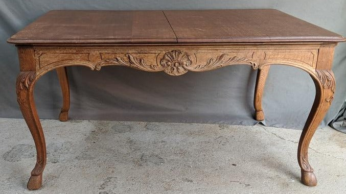 LIEGES LIGHT OAK TABLE WITH FEATHER CARVING AND HOOFED FEET