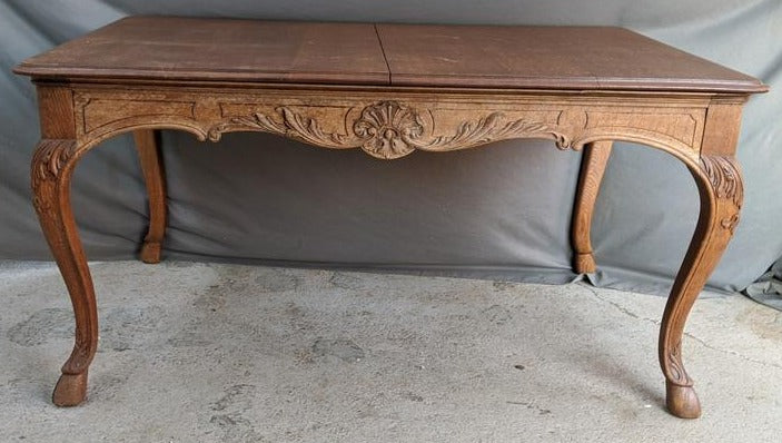 LIEGES LIGHT OAK TABLE WITH FEATHER CARVING AND HOOFED FEET