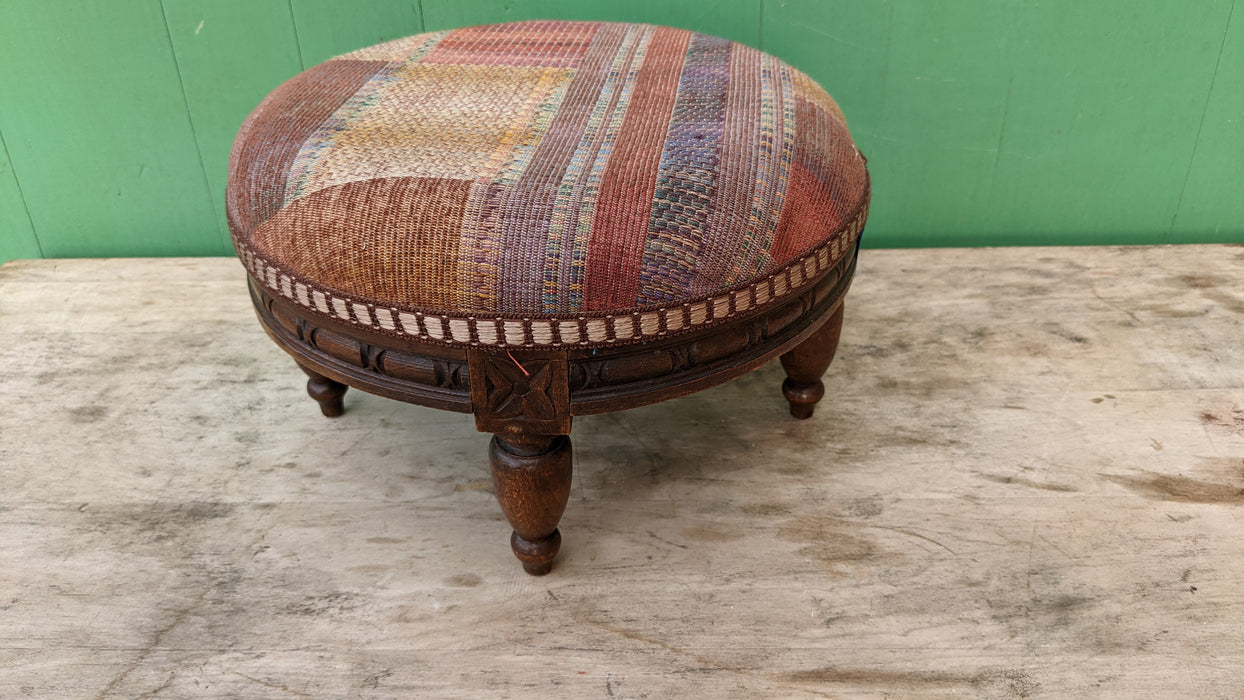 ROUND UPHOLSTERED FOOT STOOL