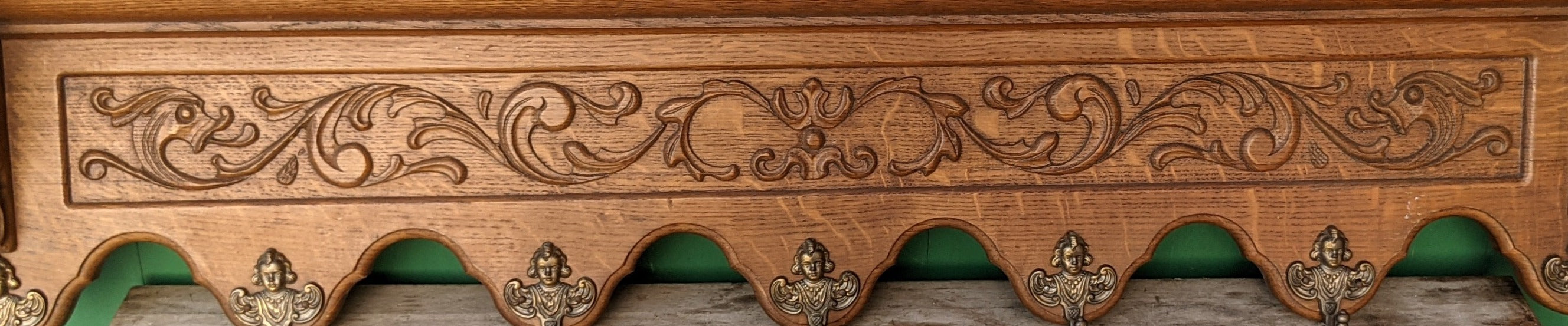 LONG FOLIATE DESIGN OAK WALL SHELF WITH BRASS ANGEL HOOKS