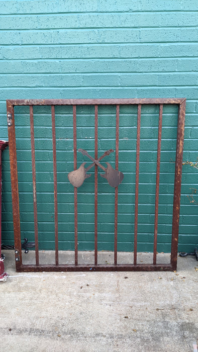 SMALL IRON GATE WITH CROSSED GUITARS