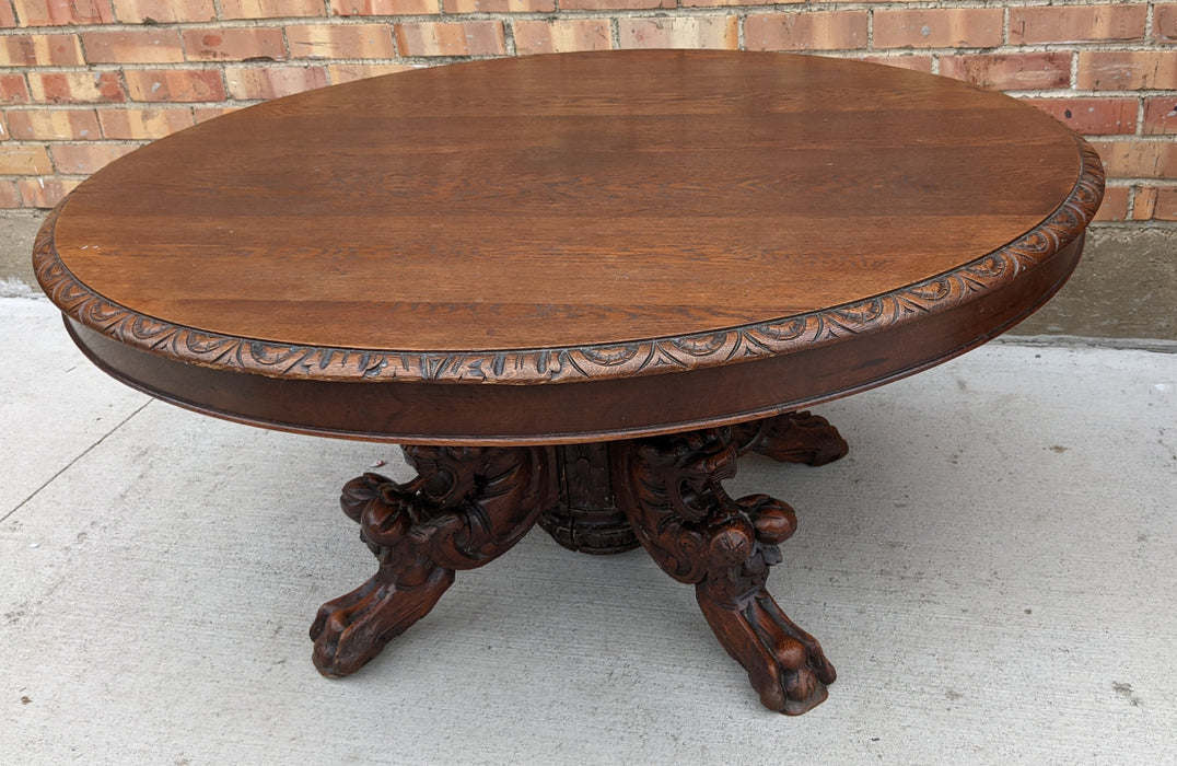 OAK COFFEE TABLE WITH CARVED LIONS