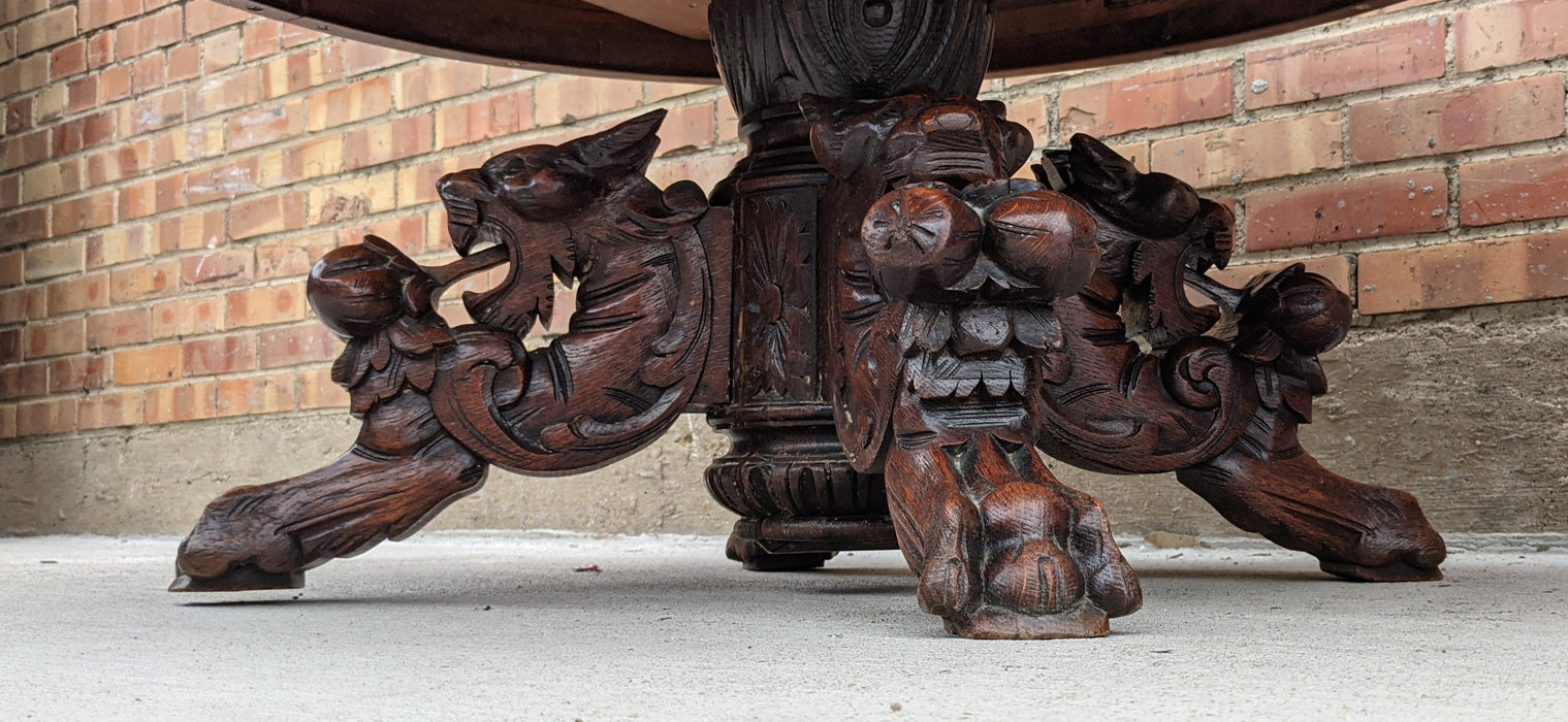 OAK COFFEE TABLE WITH CARVED LIONS