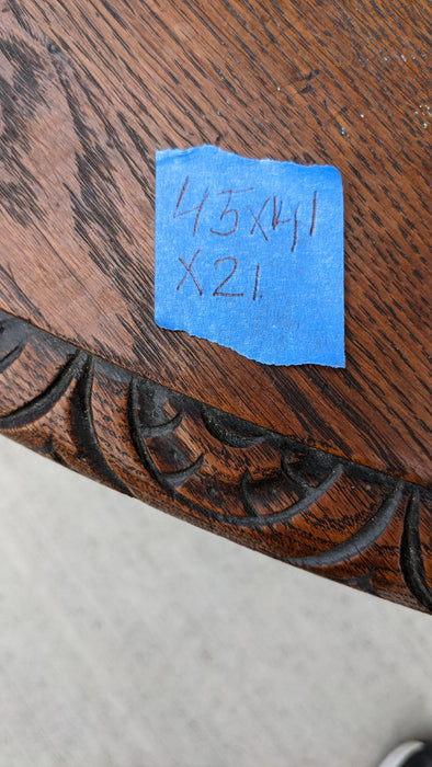 OAK COFFEE TABLE WITH CARVED LIONS