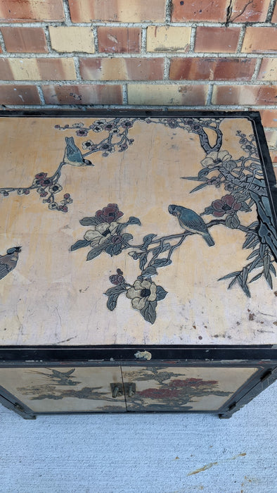 GOLD AND BLACK CHINESE SIDE CABINET WITH FLOWERS