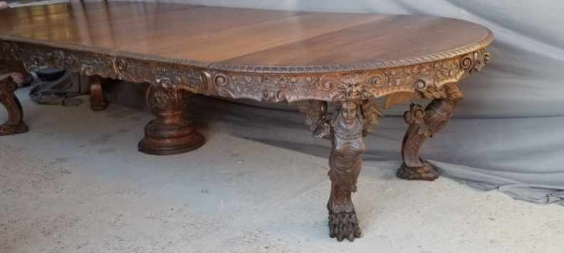 141", ALMOST 12 FEET LONG HIGHLY CARVED OVAL TABLE WITH WINGED ANGELS-BY RJ HORNER
