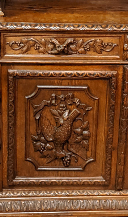 LARGE CARVED HUNTBOARD WITH FISH AND BIRDS