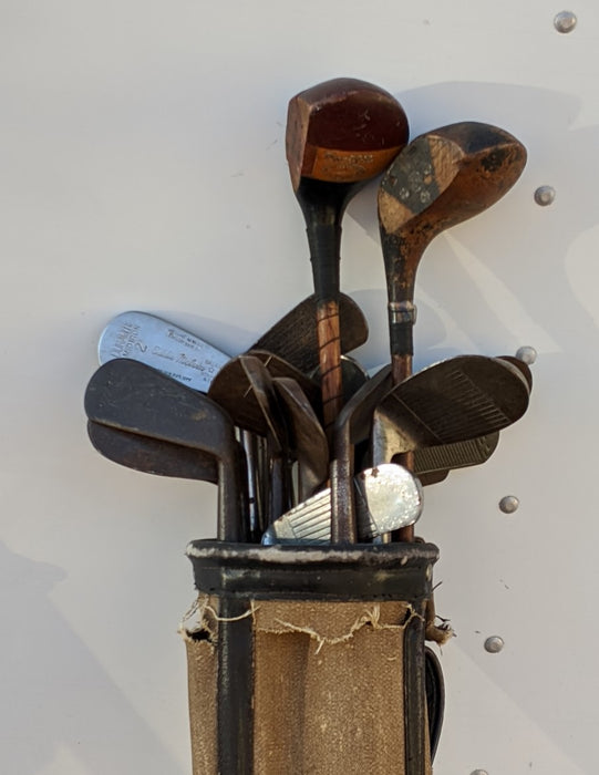 14 GOLF CLUBS IN AS IS VINTAGE CANVAS BAG
