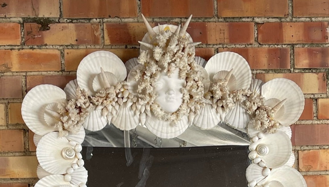 SHELL FRAMED MIRROR WITH LADY HEAD