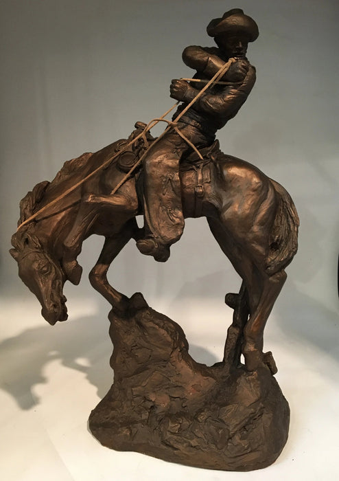 LARGE COWBOY ON HORSE STATUE