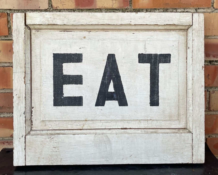 PANELED "EAT" SIGN