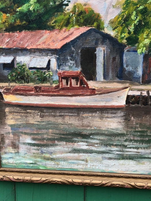 SMALL OIL PAINTING OF BOATS IN A TROPICAL SETTING