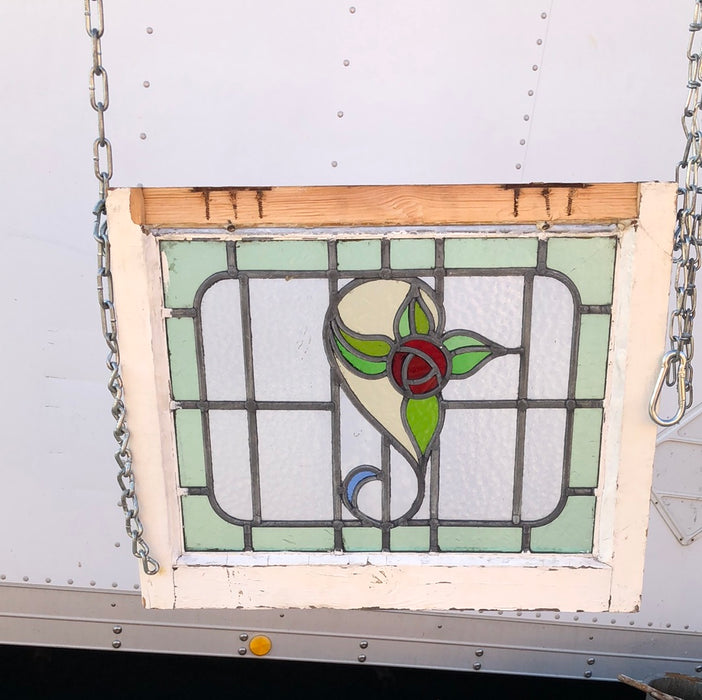 STAINED GLASS WINDOW WITH RED ROSE AND GREEN BORDER