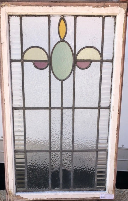 MEDIUM VERTCAL STAINED GLASS WINDOW WITH GREEN OVAL AND YELLOW HALF OVALS