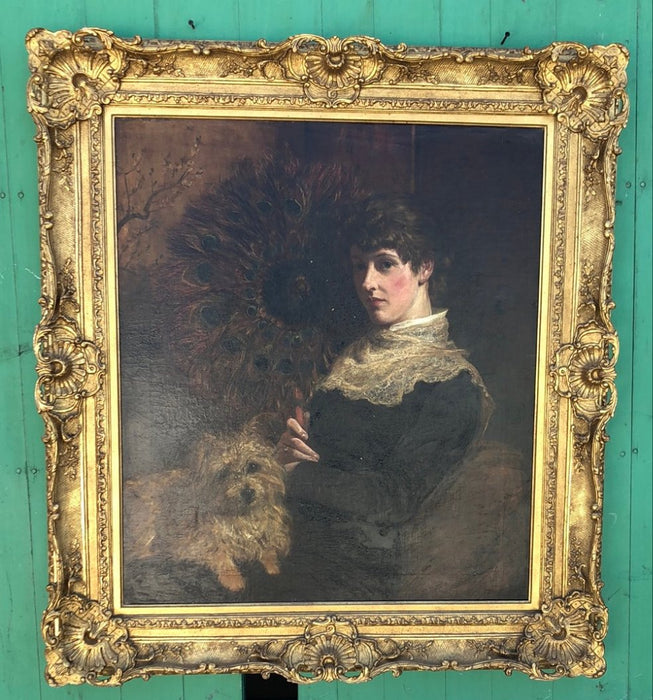 ORNATE GILT FRAMED OIL PAINTING OF A LADY AND HER DOG ON CANVAS