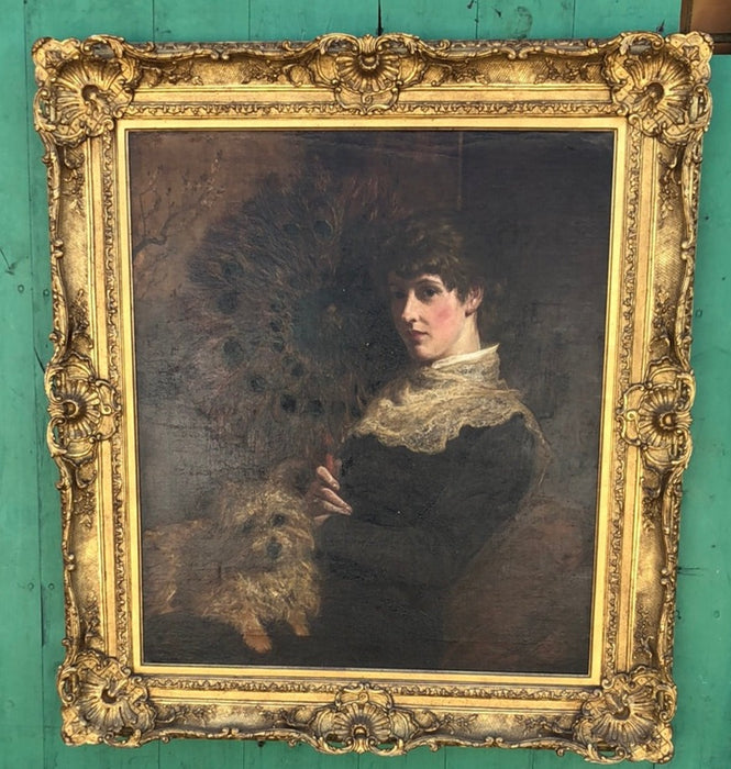 ORNATE GILT FRAMED OIL PAINTING OF A LADY AND HER DOG ON CANVAS