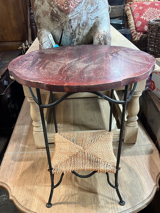 METAL BASE PATIO TABLE WITH MAHOGANY TOP AND RUSH STRETCHER SHELF