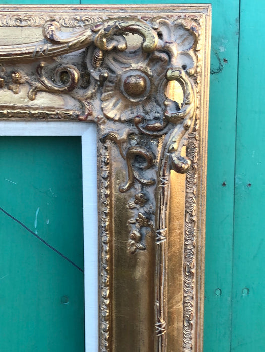 ORNATE GILT COMPOSITION FRAME