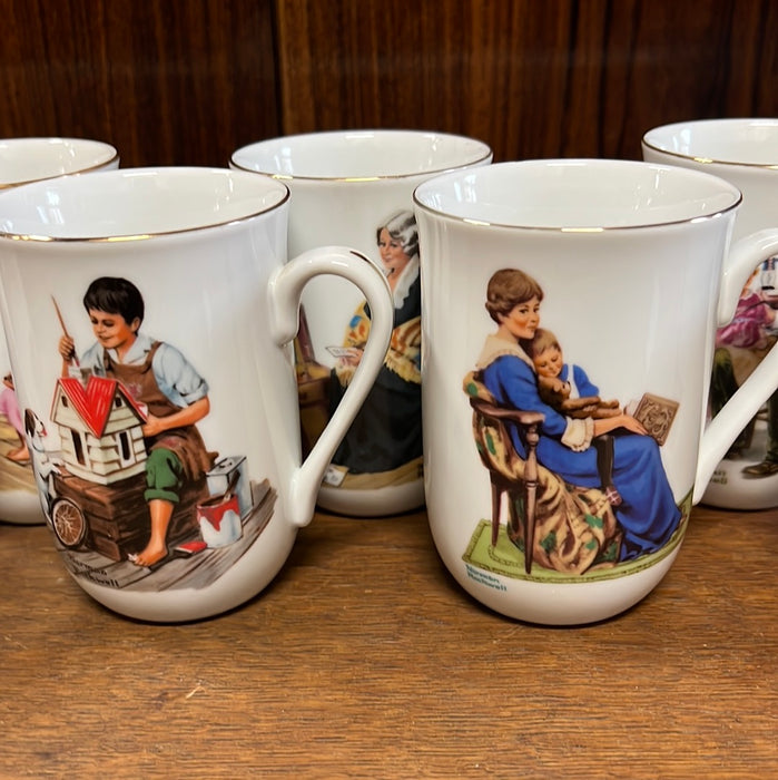 SET OF 8 NORMAN ROCKWELL MUGS