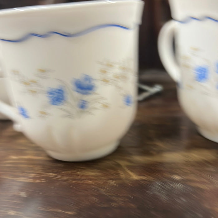 SET OF FIVE WHITE TEACUPS WITH BLUE FLOWERS