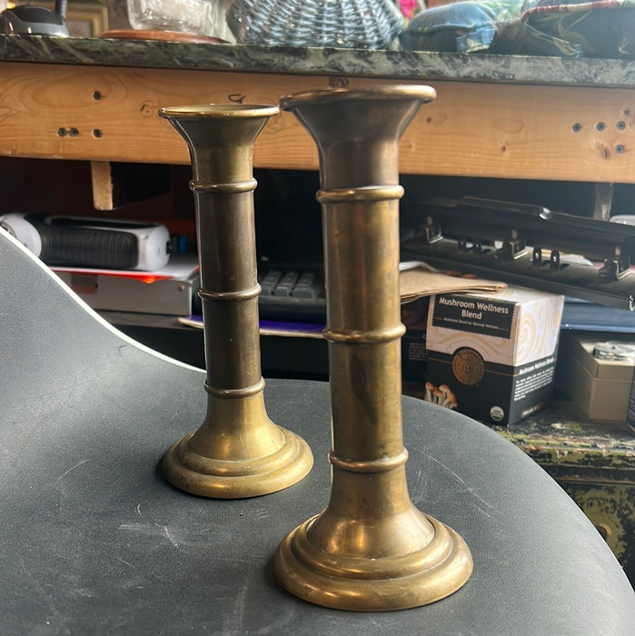 PAIR OF SMALL SUGMENTED BRASS CANDLESTICKS