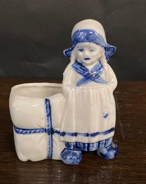 DELFT LITTLE GIRL WITH FLOWERS VASE