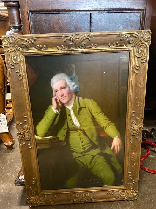 ORNATE BRONZE GESSO FRAME WITH GREEN GARBED MAN