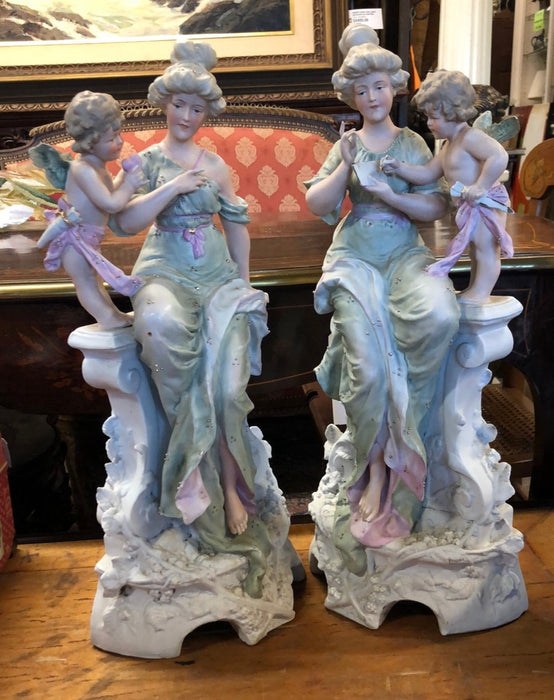 PAIR OF LARGE BISQUE LADY WITH CHERUBS FIGURES