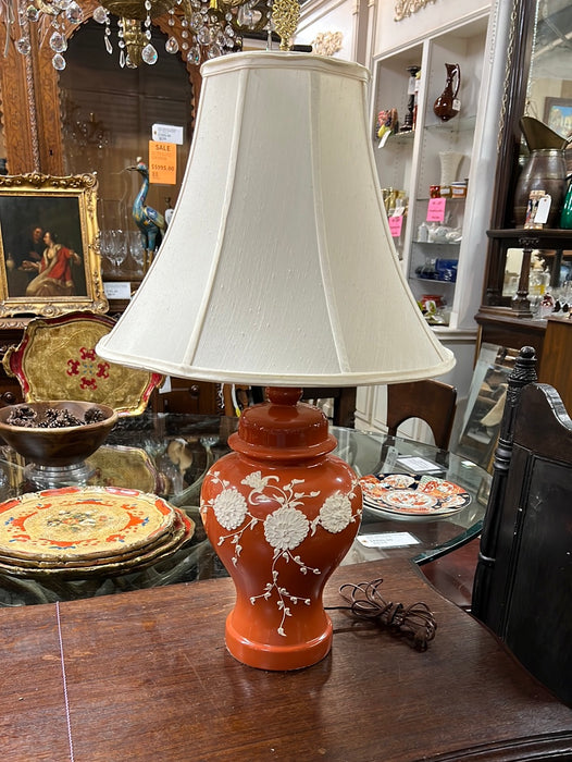 ORANGE GINGER JAR STYLE LAMP WITH RAISED WHITE FLOWERS