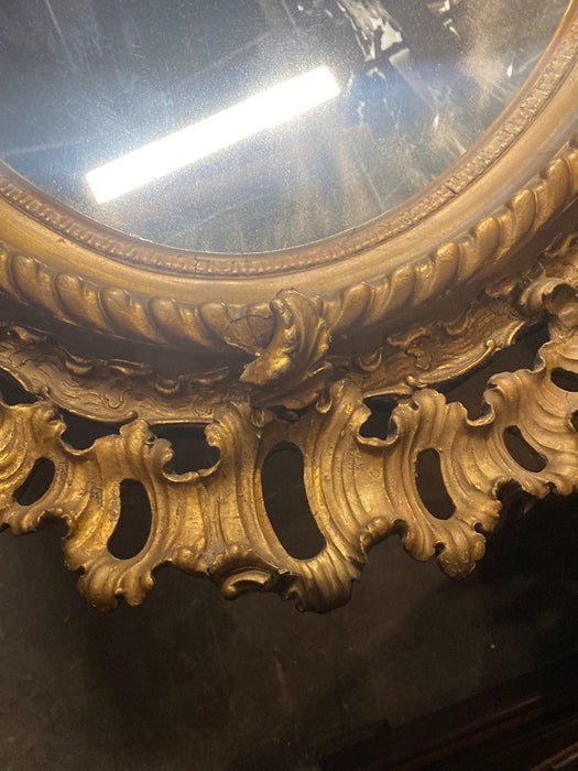 LARGE ORNATE OVAL 19TH C. GOLD FRENCH MIRROR