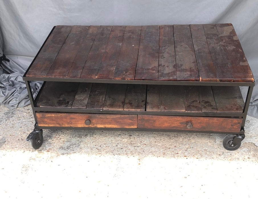 IRON AND WOOD COFFEE TABLE WITH DRAWERS ON CASTERS
