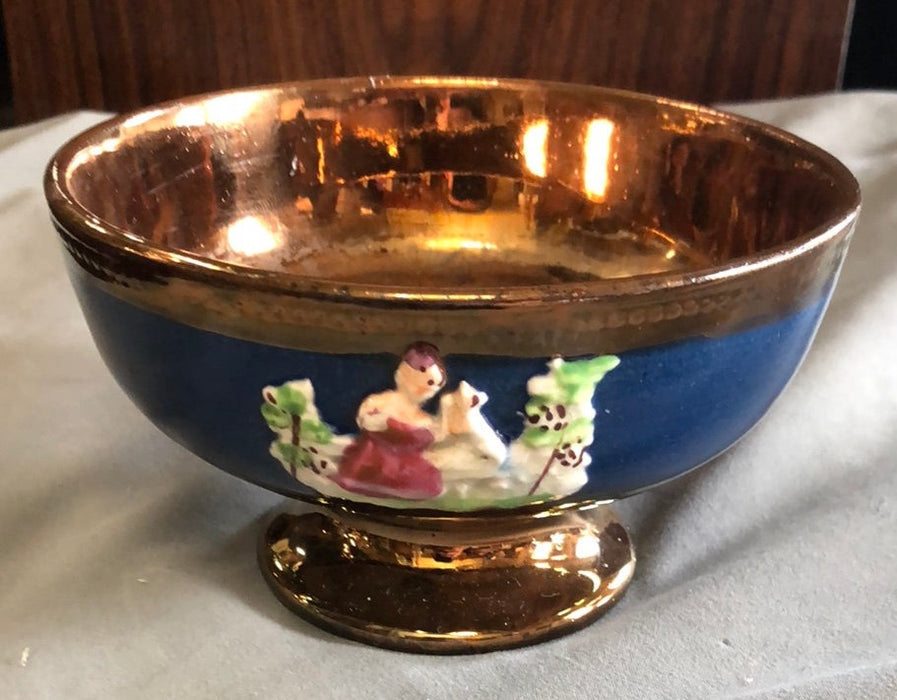 COPPER LUSTER FOOTE BOWL WITH WOMAN