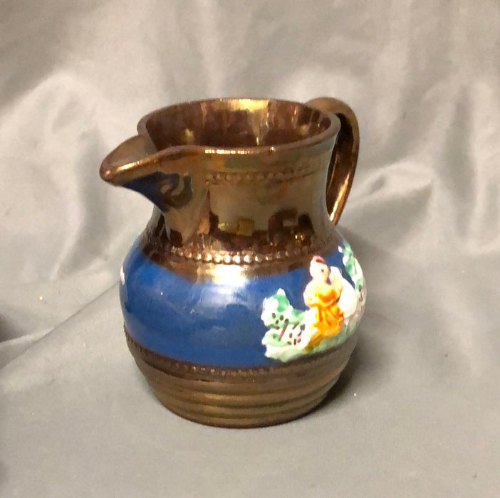 SMALL COPPER LUSTER PITCHER WITH WOMAN AND DUCK