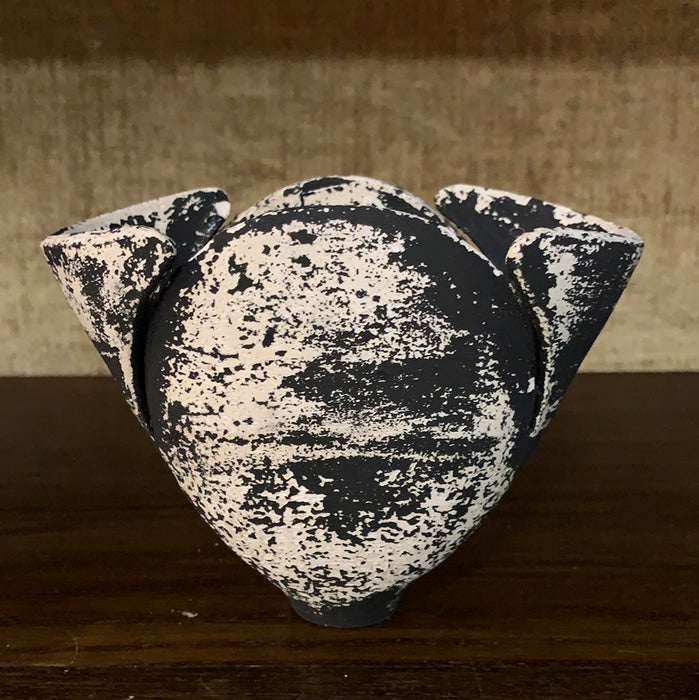BLACK AND CREAM ODD SHAPED POTTERY VESSEL