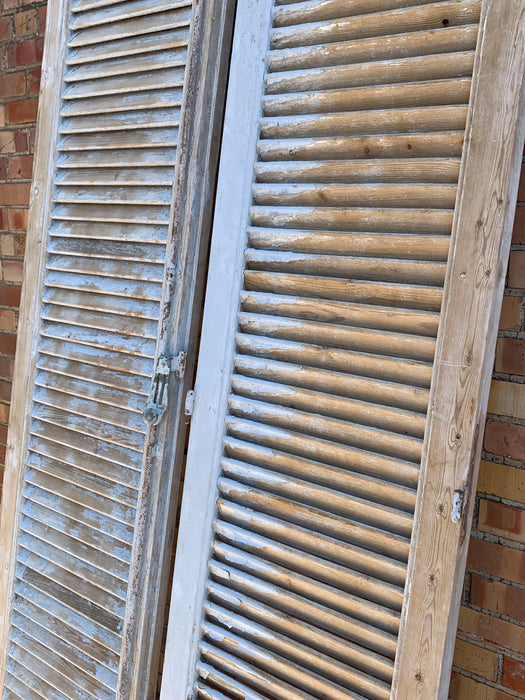 PAIR OF TALL WHITE SHUTTERS