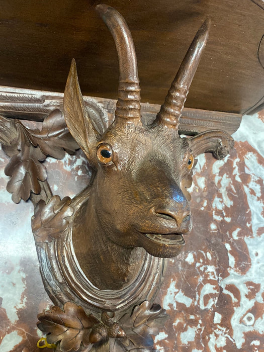 LARGE CARVED ROEBUCK SHELF WITH GLASS EYES