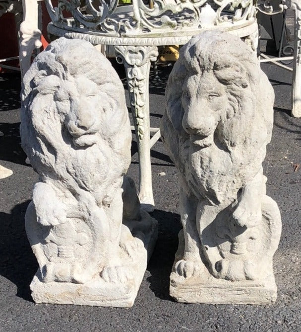 PAIR OF SMALL CONCRETE LIONS