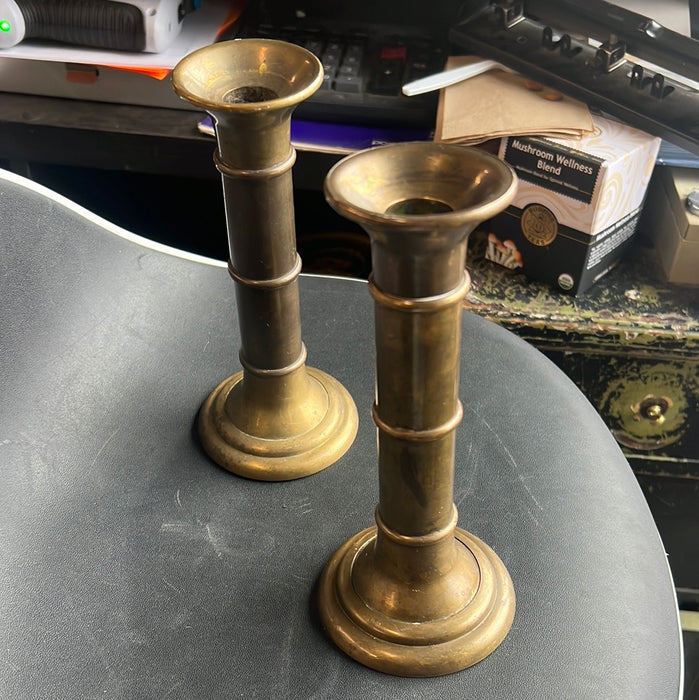 PAIR OF SMALL SUGMENTED BRASS CANDLESTICKS