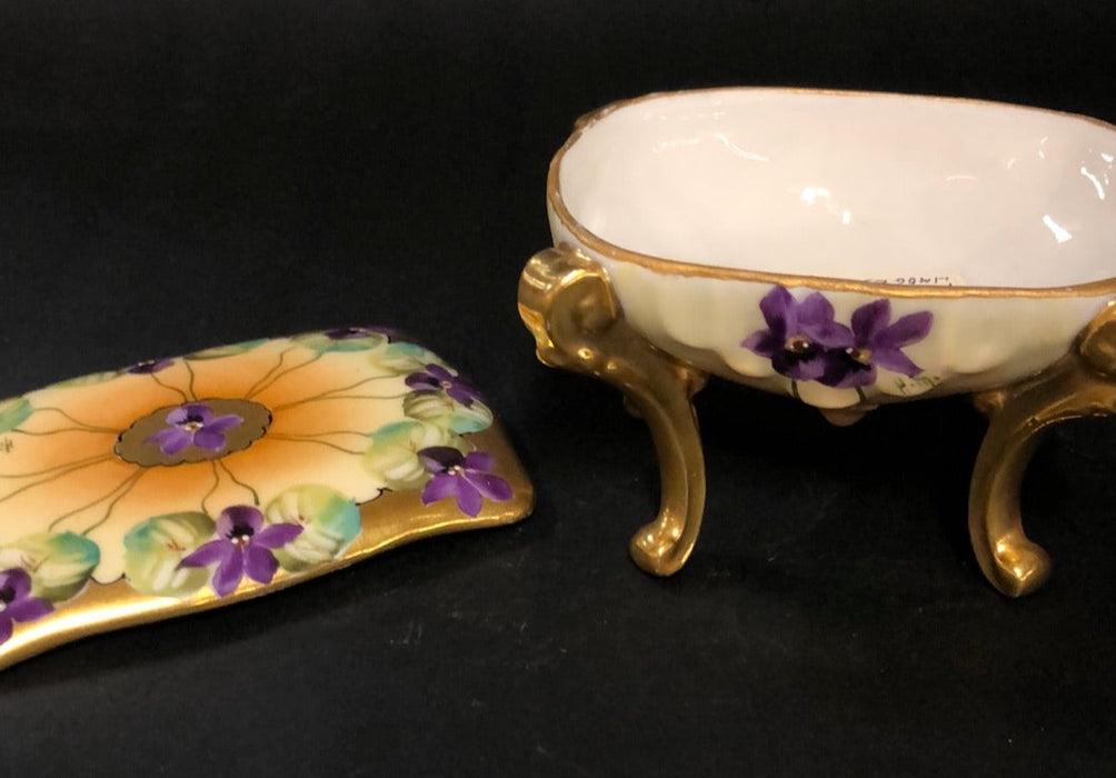 HAND ENAMELED AND GILT PURPLE FLOWERS PORCELAIN BOX ON LEGS