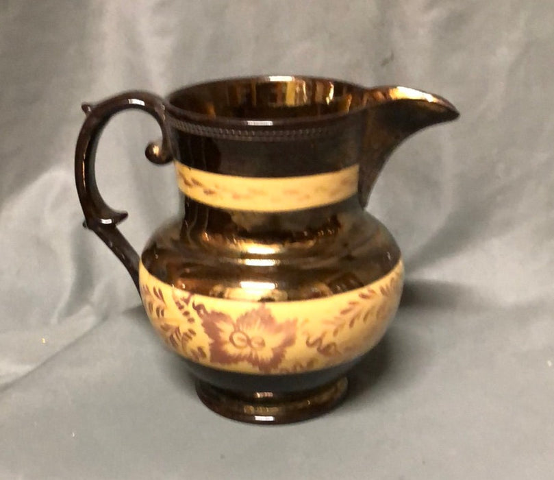 COPPER LUSTER MEDIUM PITCHER WITH 2 ORANGE BANDS & PURPLE FLOWERS