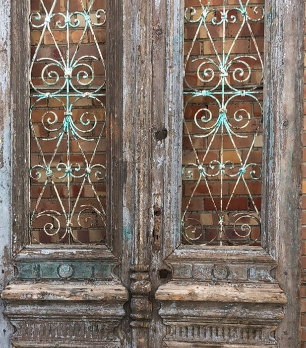 PAIR OF TALL EGYPTIAN DOORS WITH WROUGHT IRON DETAILS