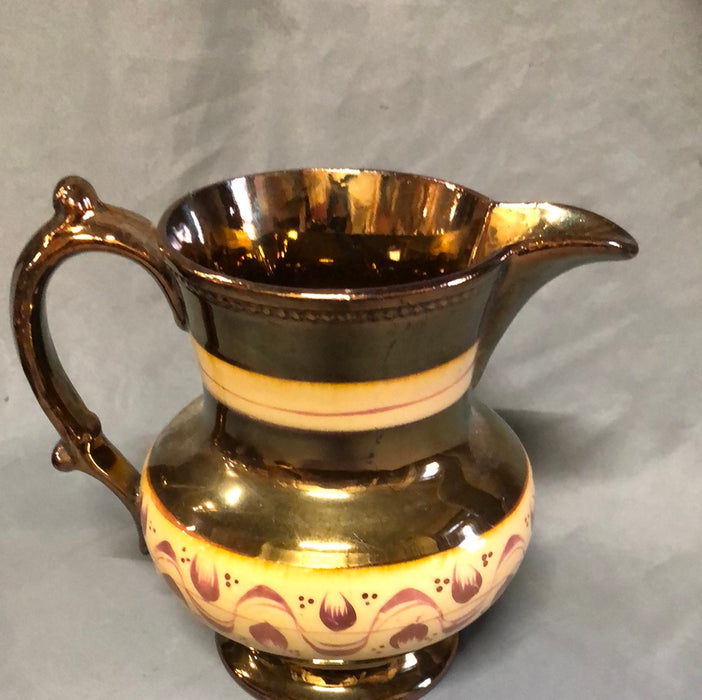 COPPER LUSTER PITCHER WITH 2 ORANGE BANDS AND TULIPS