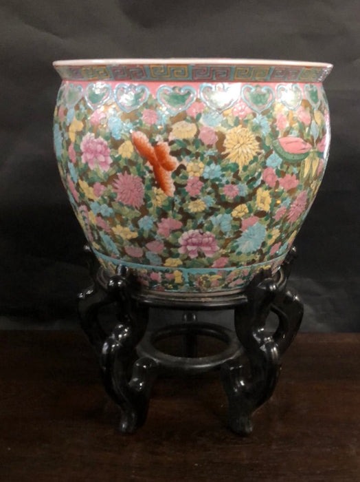 CHINESE PLANTER WITH FLOWERS ON BLACK STAND