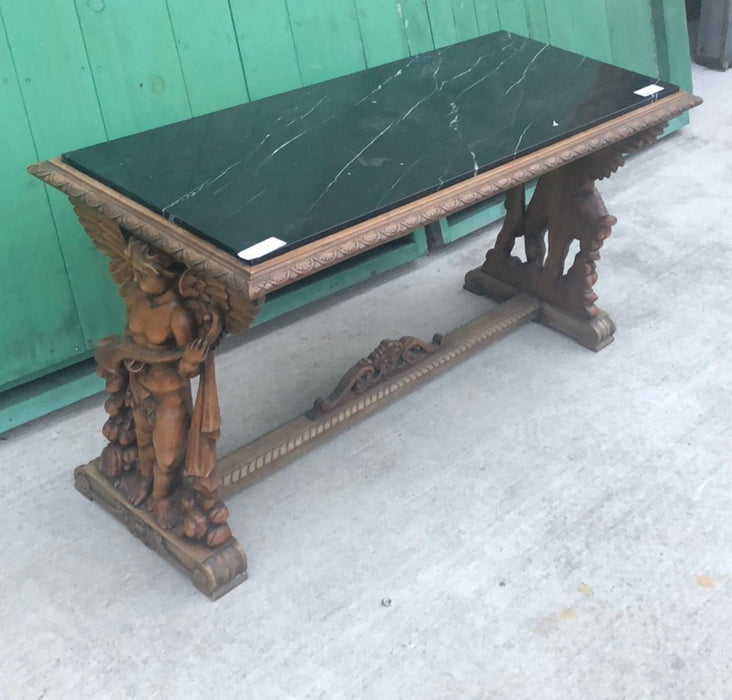 LARGE CARVED ANGEL TABLE WITH BLACK MARBLE TOP