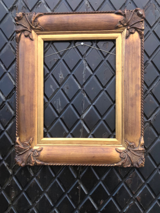 TWO TONED GOLD FRAME WITH ORNATE CORNERS