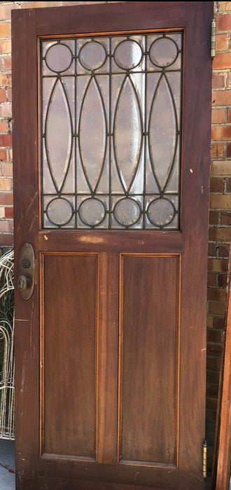 MAHOGANY TURN OF THE CENTURY DOOR WITH LEADED AND BEVELED GLASS