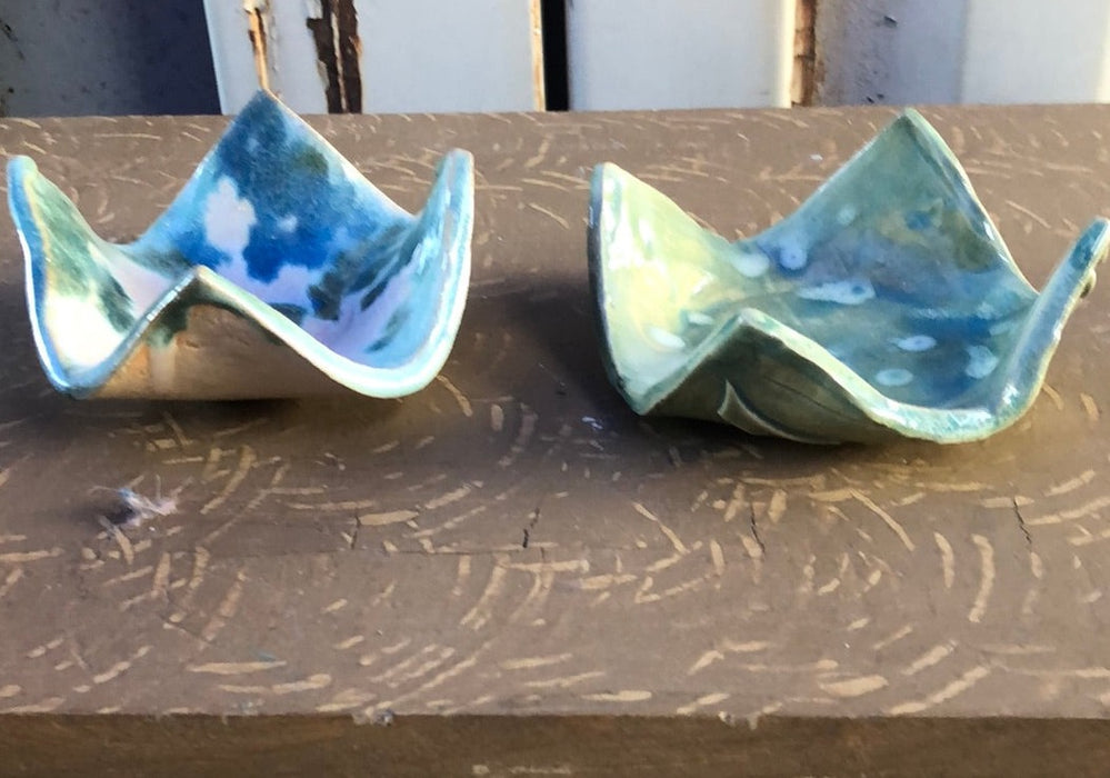 PAIR OF GLAZED LEAF DISHES