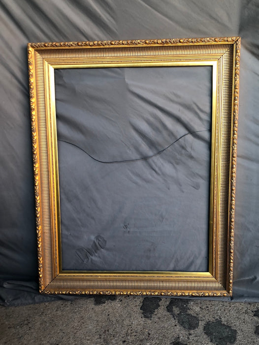 TALL CONCAVE FLUTED GOLD FRAME WITH RELIEF