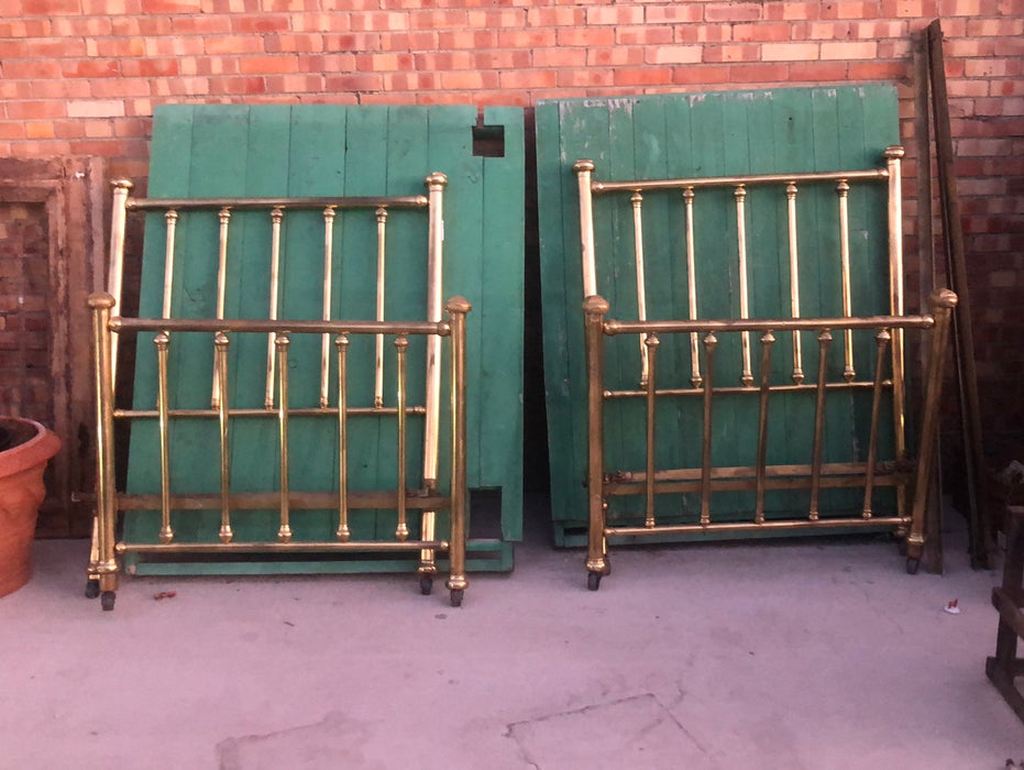 PAIR OF HIGHBACK BRASS TWIN BEDS